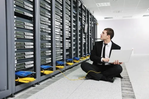 network engineer working in server room
